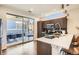 Modern kitchen with stainless steel appliances, sleek cabinetry, and seamless flow to outdoor patio at 3361 Mariposa St, Denver, CO 80211