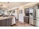 Bright kitchen equipped with modern appliances and an open layout that's great for entertaining at 3361 Mariposa St, Denver, CO 80211