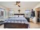 Spacious main bedroom featuring a large bed, neutral decor, and plenty of natural light at 3361 Mariposa St, Denver, CO 80211