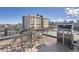 Rooftop deck with grill, outdoor seating, and city views, perfect for entertaining or relaxing outside at 3361 Mariposa St, Denver, CO 80211