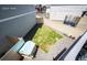 Backyard view showing partial grass area, gravel, trampoline and playhouse at 4443 N Quatar Ct, Aurora, CO 80019