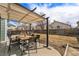 Backyard features covered patio and plenty of space for entertainment at 9756 E 113Th Ave, Commerce City, CO 80640