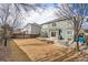 Spacious backyard features covered patio and large grass area at 9756 E 113Th Ave, Commerce City, CO 80640