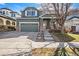 Charming two-story home with a well-maintained front yard and a two car garage in a desirable neighborhood at 9756 E 113Th Ave, Commerce City, CO 80640