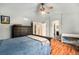 Spacious main bedroom with walk-in closet and view to main bathroom entrance at 9756 E 113Th Ave, Commerce City, CO 80640
