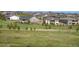 Beautiful homes with well-manicured lawns and backyard privacy fencing at 8761 S Wenatchee Ct, Aurora, CO 80016