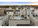 Rooftop terrace with seating, dining, grill, and great community views at 12261 Farmview St, Thornton, CO 80241