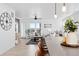 Open-concept living space features hardwood floors, modern decor, and bright natural light at 12261 Farmview St, Thornton, CO 80241