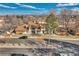 Aerial view of the townhome complex shows well-maintained landscaping and ample parking at 3502 S Kittredge St # C, Aurora, CO 80013