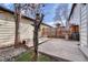 Backyard patio features a wood deck, concrete area, and a small patch of artificial turf at 3502 S Kittredge St # C, Aurora, CO 80013