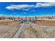 Aerial view of baseball field, featuring a clear blue sky with fair-weather clouds at 3502 S Kittredge St # C, Aurora, CO 80013