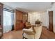 Warm living room with built-in cabinets and a large window with natural light at 3502 S Kittredge St # C, Aurora, CO 80013