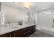 Modern bathroom with double vanity and a bathtub at 1861 W 34Th Ave, Denver, CO 80211