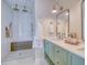 Beautiful bathroom with a luxurious shower featuring dual shower heads and a spacious double sink vanity at 541 Fox St, Denver, CO 80204