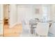 Inviting dining room with hardwood floors, modern table setting, and abundant natural light at 541 Fox St, Denver, CO 80204
