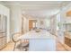 Bright open kitchen with large center island connecting to the dining area, and stainless appliances at 541 Fox St, Denver, CO 80204