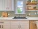 Stylish kitchen featuring quartz countertops, undermount sink, modern cabinetry, and stainless steel appliances at 541 Fox St, Denver, CO 80204