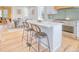 Open-concept kitchen and dining area perfect for entertaining, with hardwood floors and modern appliances at 541 Fox St, Denver, CO 80204