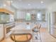 Spacious and modern kitchen with a large island, stainless steel appliances, and stylish decor at 541 Fox St, Denver, CO 80204
