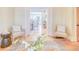 Bright living room featuring hardwood floors and a smooth transition to the dining area at 541 Fox St, Denver, CO 80204