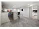 Spacious finished basement with a bar area, stone accents, and modern flooring, ideal for entertaining and relaxation at 420 N Colorado Blvd, Denver, CO 80206