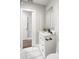 Bright bathroom with a white vanity, modern fixtures, and marble tile flooring, creating a clean, contemporary look at 420 N Colorado Blvd, Denver, CO 80206