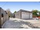 Three-car garage with modern doors and plenty of driveway space at 420 N Colorado Blvd, Denver, CO 80206