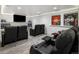 A great entertainment area featuring comfy black recliners with cup holders and flatscreen television at 420 N Colorado Blvd, Denver, CO 80206