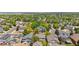 Neighborhood aerial shot showcases the mature trees, manicured lawns, and well-kept homes in the area at 3102 White Oak Trl, Highlands Ranch, CO 80129