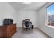 Home office featuring a desk, chair, and a window for great lighting at 3102 White Oak Trl, Highlands Ranch, CO 80129