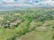 Aerial view of Ravines Open Space showcasing the expansive greenery and rolling hills in the neighborhood at 1811 S Yank Ct, Lakewood, CO 80228