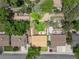 Aerial view of the property showcasing the lot boundary, home, and outdoor living spaces including a patio at 1811 S Yank Ct, Lakewood, CO 80228
