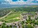 Aerial view of Dunstan Middle School and surrounding neighborhood, showcasing community amenities and accessibility at 1811 S Yank Ct, Lakewood, CO 80228
