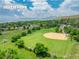Aerial view of Beech Park, a neighborhood amenity with a baseball field and green space at 1811 S Yank Ct, Lakewood, CO 80228