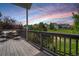 Outdoor living with seating area for relaxing on the deck with views of the community at 15502 E Flower Mound Pl, Parker, CO 80134