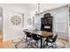 Bright dining area featuring contemporary furnishings and large windows for natural light at 15502 E Flower Mound Pl, Parker, CO 80134