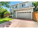 Beautiful two-story home with large windows and a two-car garage at 1526 Braewood Ave, Littleton, CO 80129