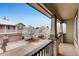 Balcony view showcases blooming trees and neighboring homes in a well-maintained community at 12914 Grant Cir # C, Thornton, CO 80241
