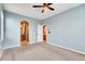 Spacious carpeted bedroom with an ensuite bathroom at 12914 Grant Cir # C, Thornton, CO 80241