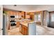Updated kitchen features modern appliances, sleek countertops, and ample cabinet space for storage and meal prep at 12914 Grant Cir # C, Thornton, CO 80241