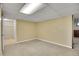 Finished basement area with tan paint and carpeting at 8005 Emerald Ln, Broomfield, CO 80020