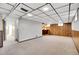 Spacious finished basement features a carpeted floor and a wet bar at 8005 Emerald Ln, Broomfield, CO 80020