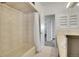 Bathroom with shower-tub combination and vanity adjacent to a separate sink area at 8005 Emerald Ln, Broomfield, CO 80020