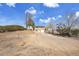 View of house with long driveway and front lawn at 8005 Emerald Ln, Broomfield, CO 80020