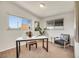 Home office with modern desk, comfortable seating, and plenty of natural light at 8005 Emerald Ln, Broomfield, CO 80020