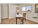 Home office featuring a white desk, and great natural light at 8005 Emerald Ln, Broomfield, CO 80020