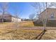 Backyard view between houses featuring a dry creek bed and view at 4894 Bierstadt Loop, Broomfield, CO 80023