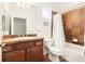 Bathroom features decorative tile, bath and shower combination, and updated vanity at 4894 Bierstadt Loop, Broomfield, CO 80023