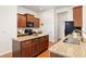 Lovely kitchen featuring an island, stainless appliances, and granite countertops for cooking at 4894 Bierstadt Loop, Broomfield, CO 80023