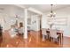 Open-concept living and dining areas with hardwood floors and a bright, airy feel at 4894 Bierstadt Loop, Broomfield, CO 80023